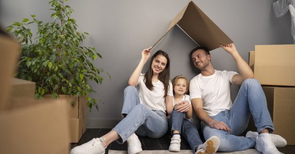 young-family-moving-into-new-home (1)